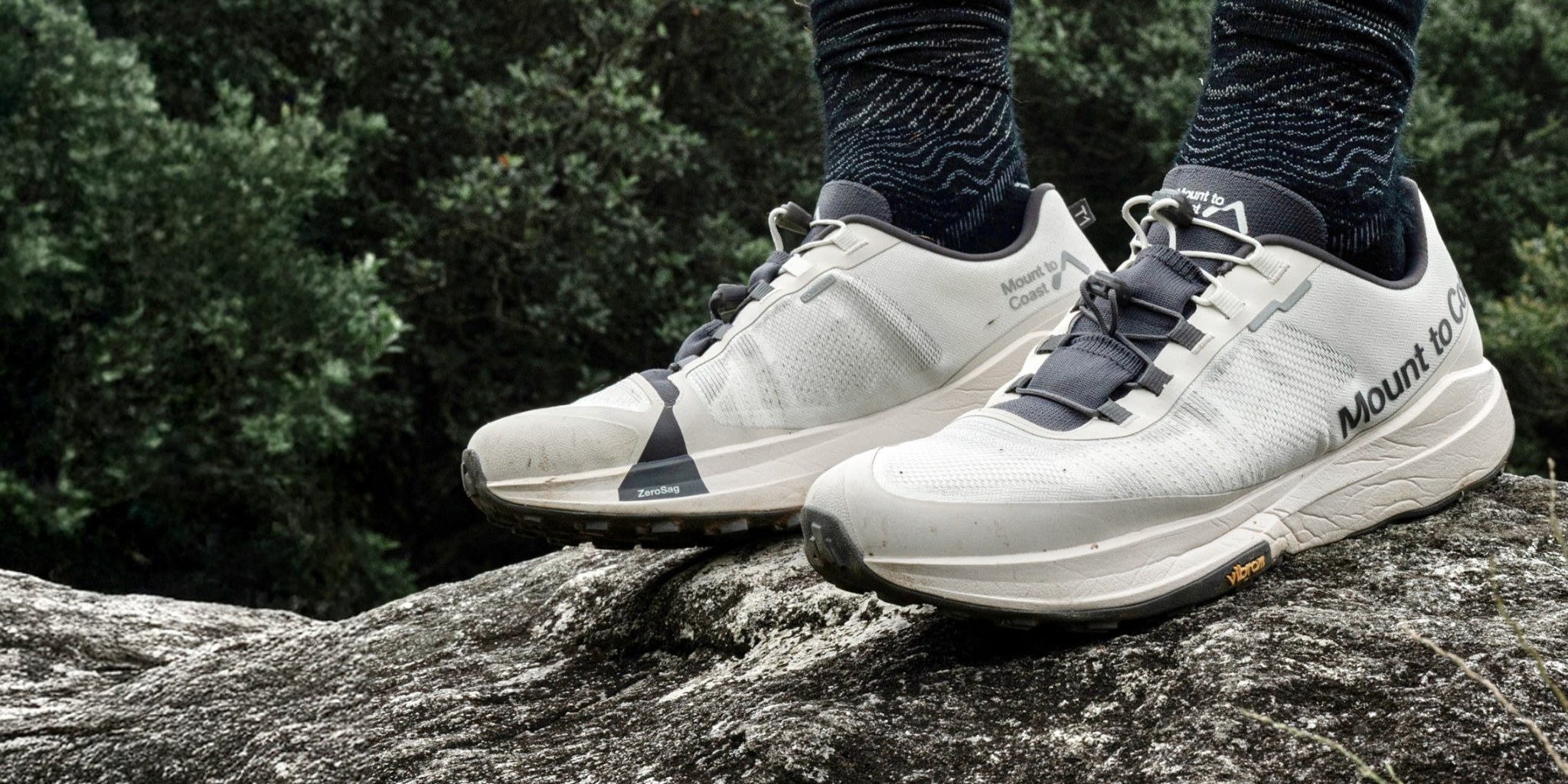 Mount to Coast trail running shoes on a rock